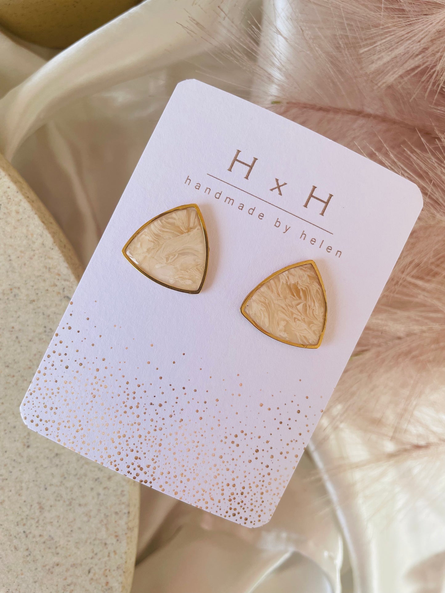 rounded triangle studs