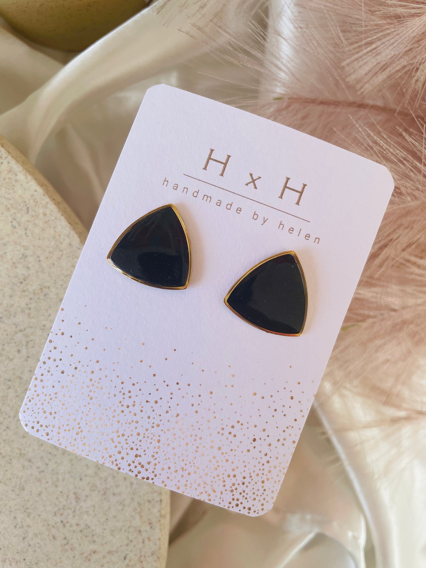 rounded triangle studs