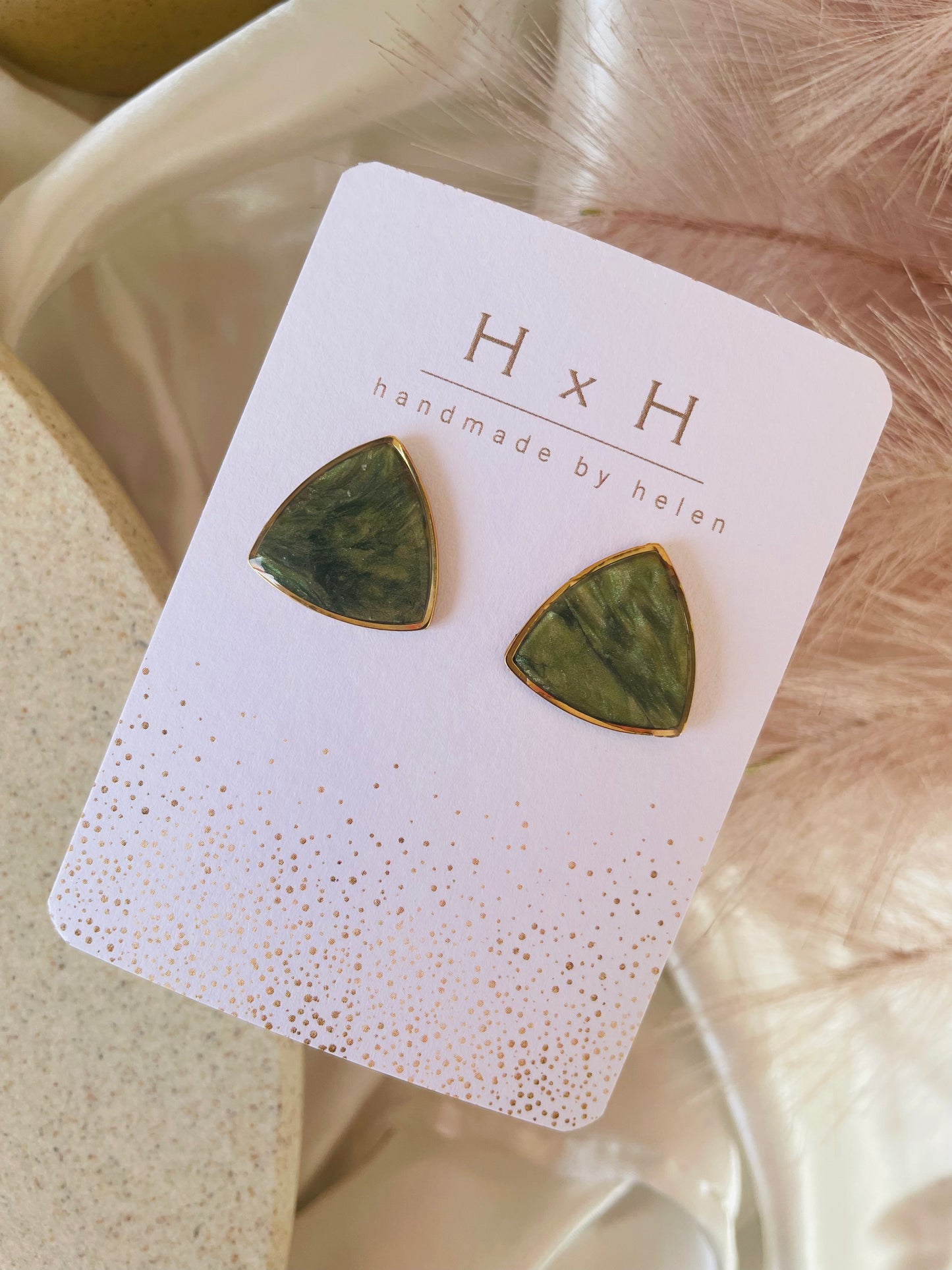 rounded triangle studs