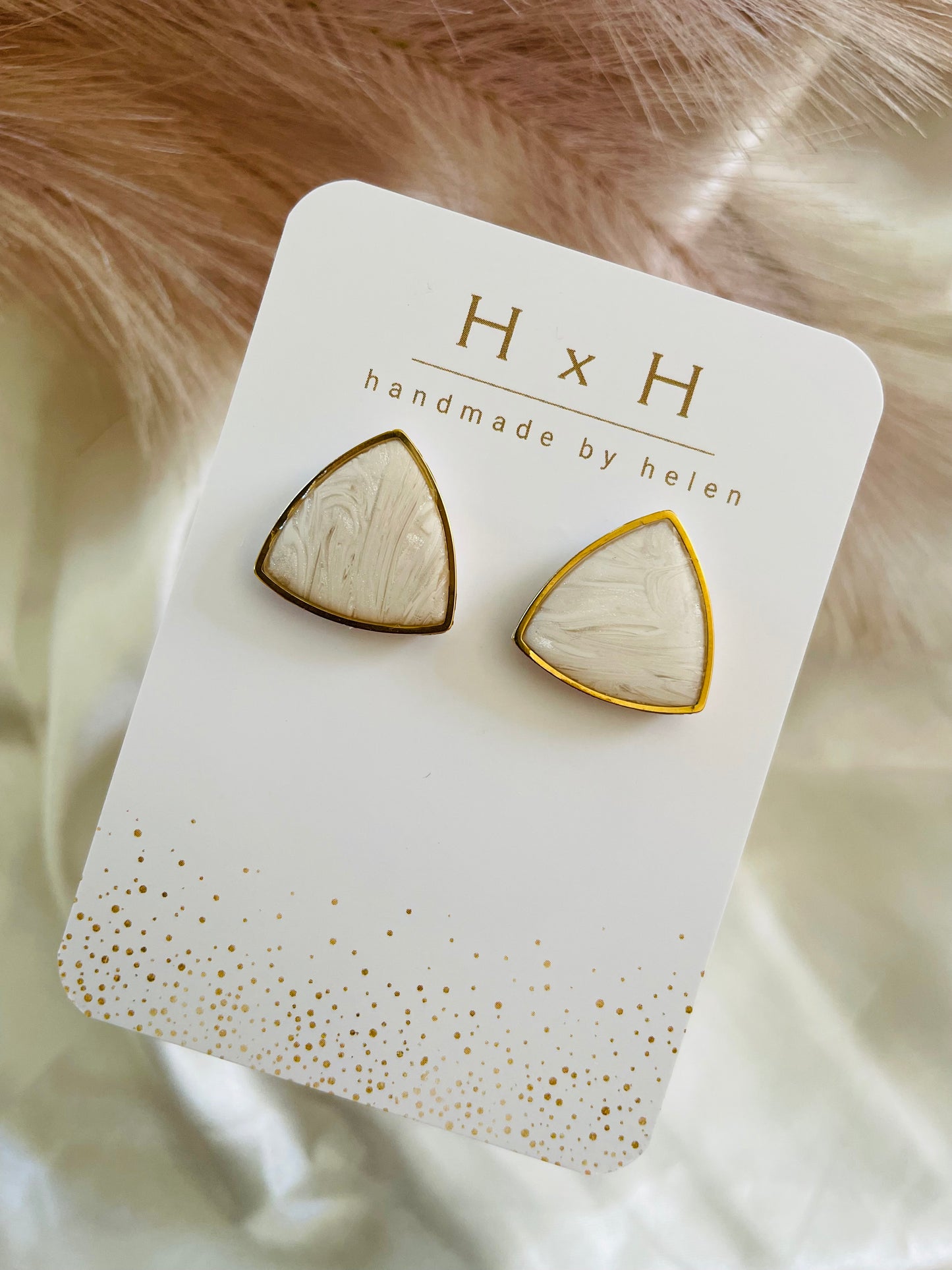 rounded triangle studs