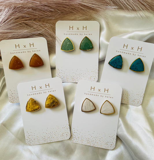 rounded triangle studs