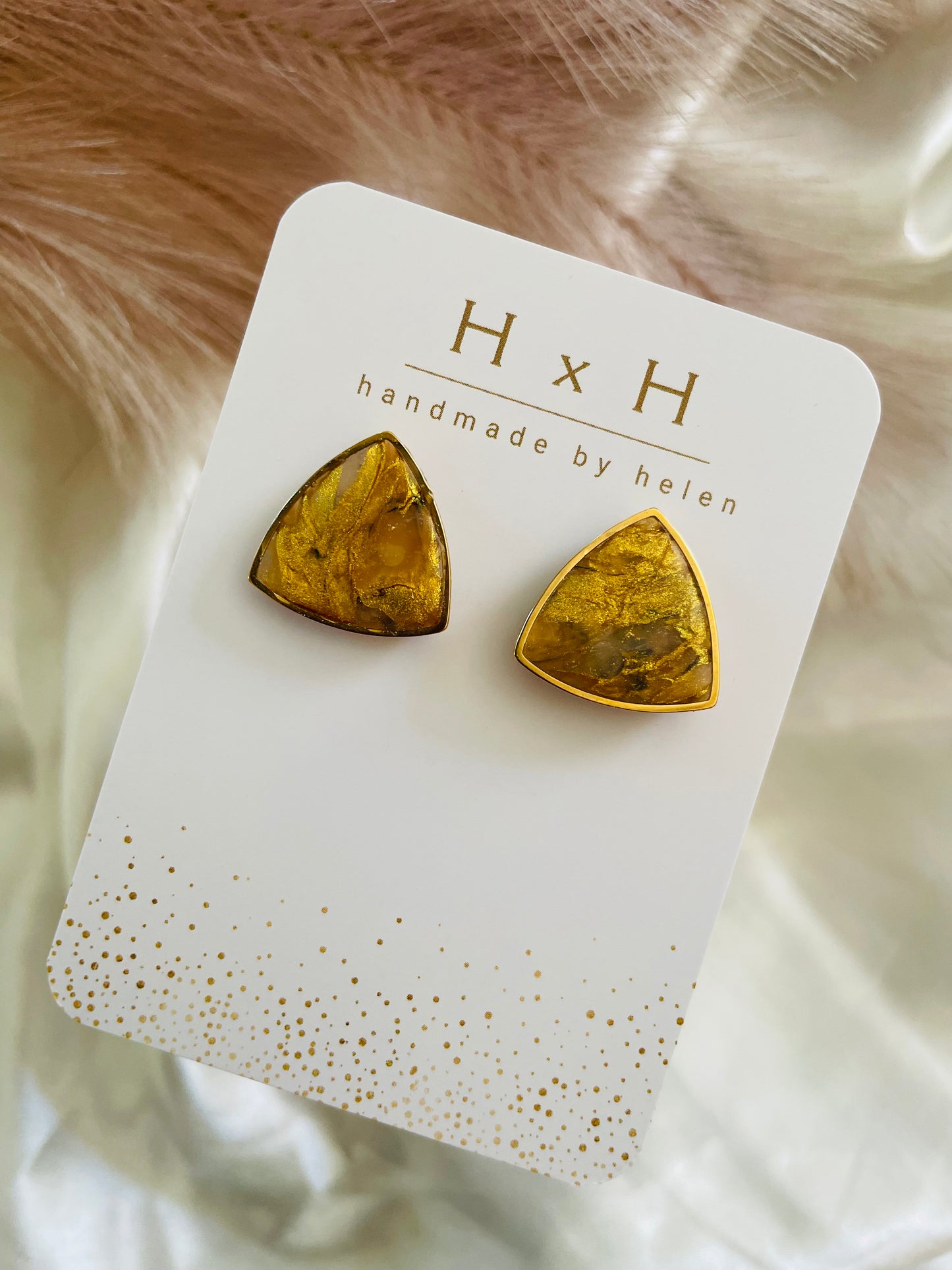 rounded triangle studs