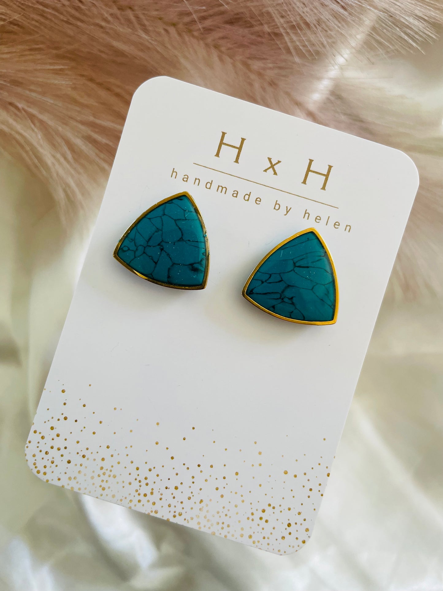 rounded triangle studs